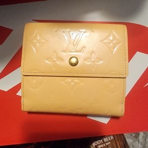 Louis Vuitton cream embossed wallet LV